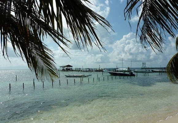 Caye Caulker is a five-mile long island off the coast of mainland Belize that offers a simple lifestyle, stunning views, and real estate that is still affordable.