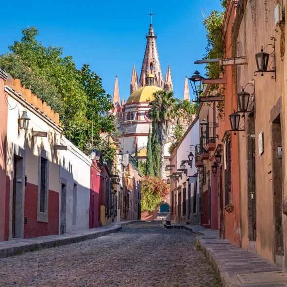 The colorful streets of San Miguel de Allende, like Calle Aldama, are a joy to wander.