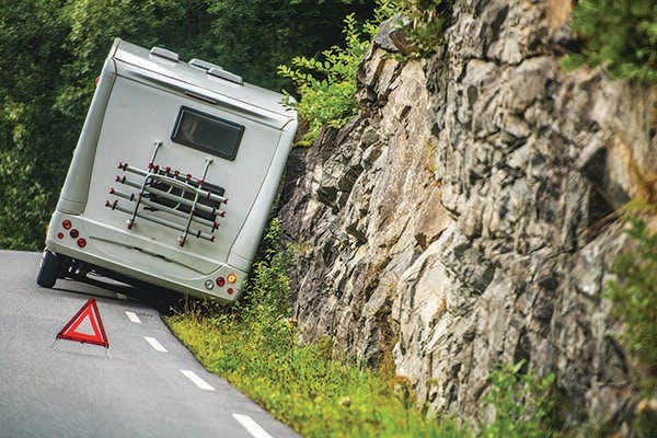 You’ll need to factor in the costs of insurance and maintenance if you choose an RV life. ©iStock/welcomia