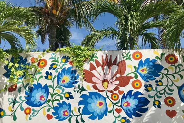 There are a lot of beautiful street murals decorating houses in Puerto Morelos